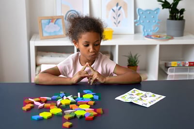 girl-thinking-with-puzzle